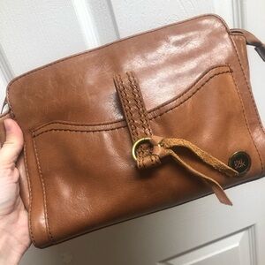 The Sak brown leather clutch handbag “Happy & Free”